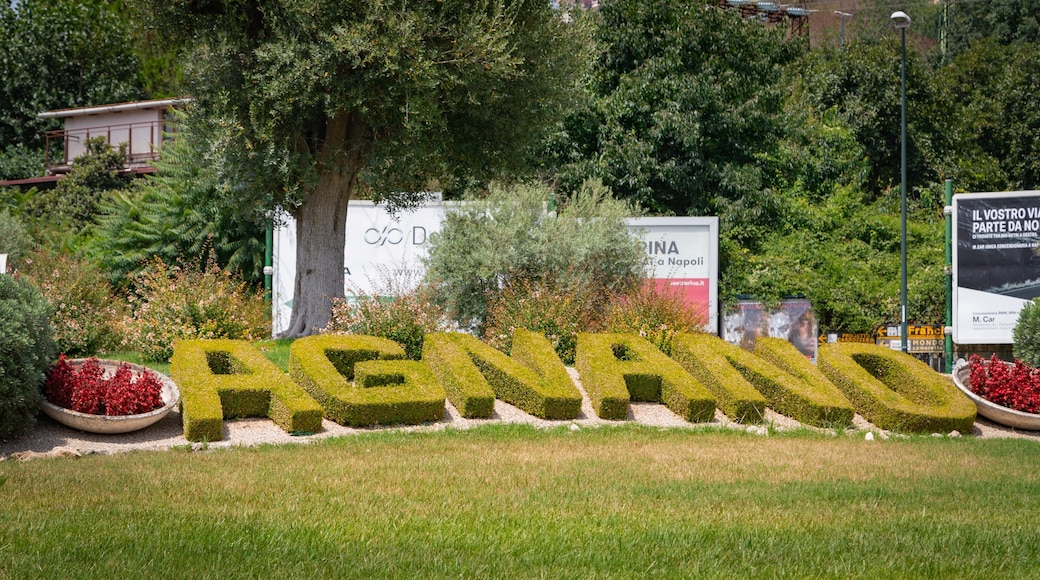 Agnano which includes outdoor art, a park and signage
