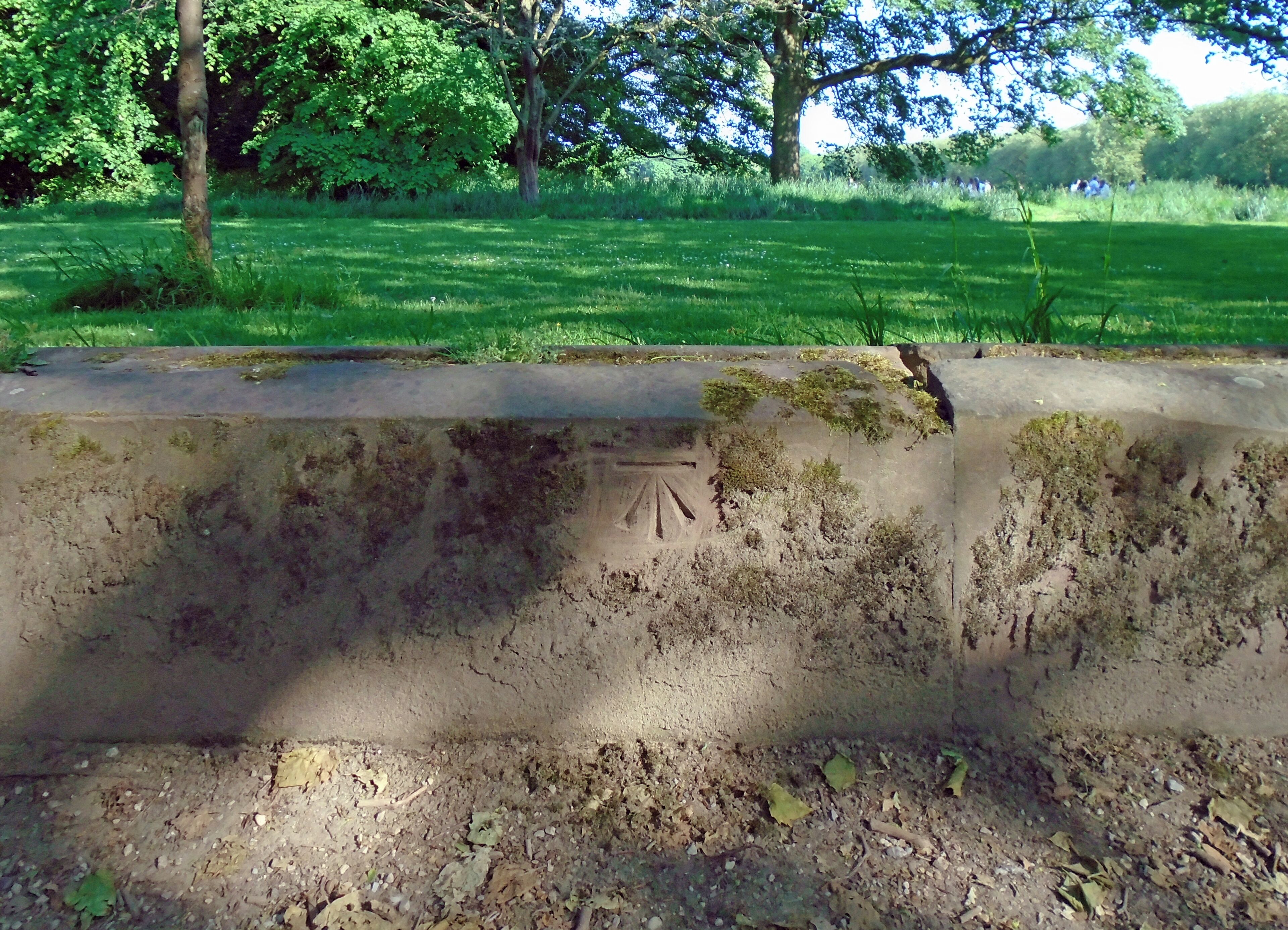 Cut mark on the perimeter wall between Aigburth Drive enrtance and Croxteth Gate. Was obscured by moss but a stick sorted that out.