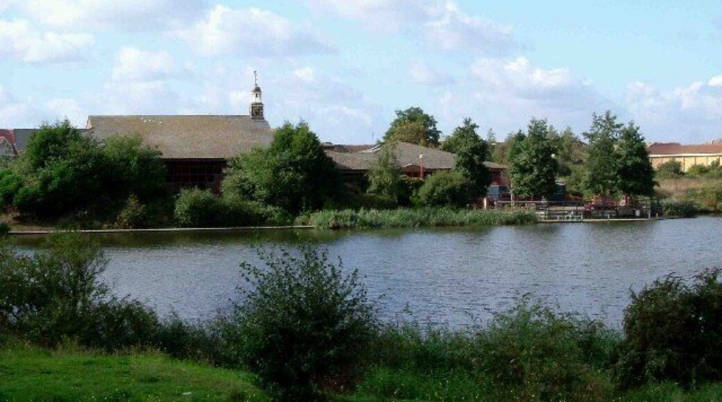 Thamesmere. Looking across Thamesmere Lake towards the Thamesmere Leisure Centre. Rather prosaically the Environment Agency pumping station on the lake refers to the location as "Lake 4".