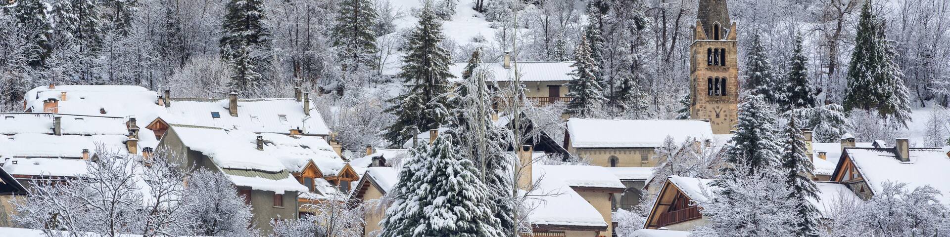 Village of La-Salle-les-Alpes with fresh snow in winter. Serre Chevalier Valley, Hautes-Alpes (05), Alps, France