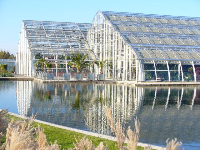 Glasshouse Gables Reflections of RHS Wisley Garden's glasshouse in the adjacent ornamental lake. http://www.rhs.org.uk/WhatsOn/gardens/wisley/index.asp