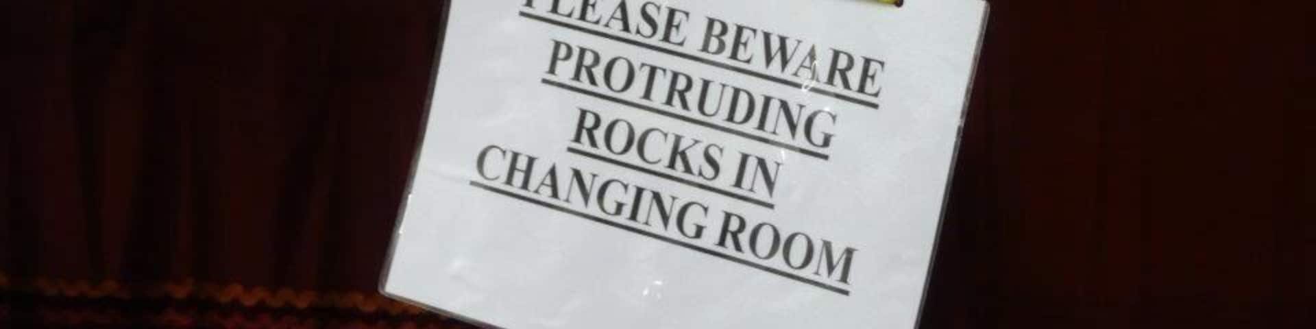 Just outside the city of Wells is a place called Wookey Hole, where you can go and visit underground caves. The whole area is very rocky with a gorge (Cheddar) nearby which is amazing. There's a small village, with shops built up against the cliffs, and in a shop selling clothing I saw this. Not a problem you get in many changing rooms!
