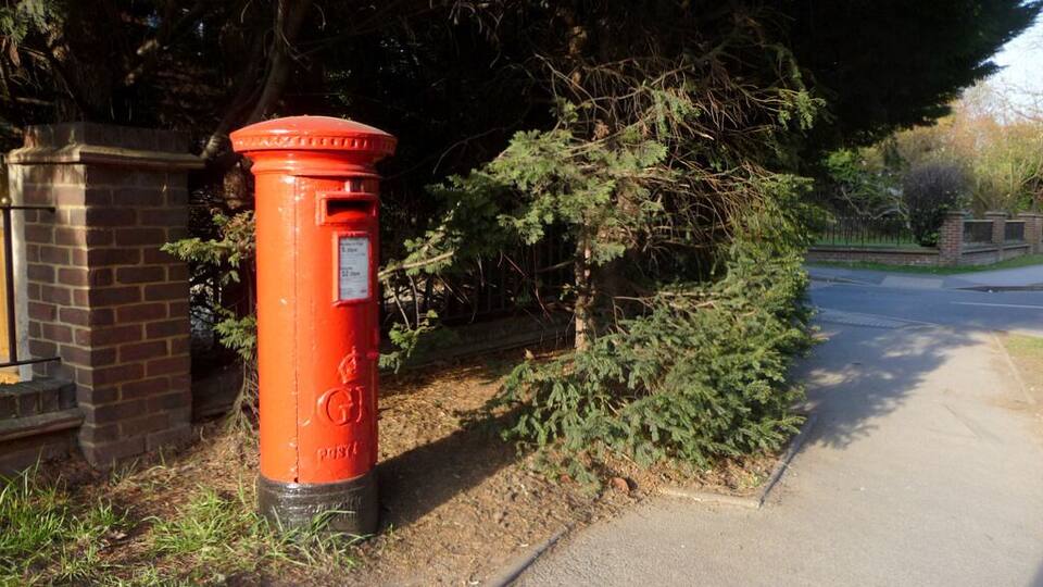 George V Pillar Box, Chessington Road, Ewell, Surrey As seen in the late afternoon sunshine.