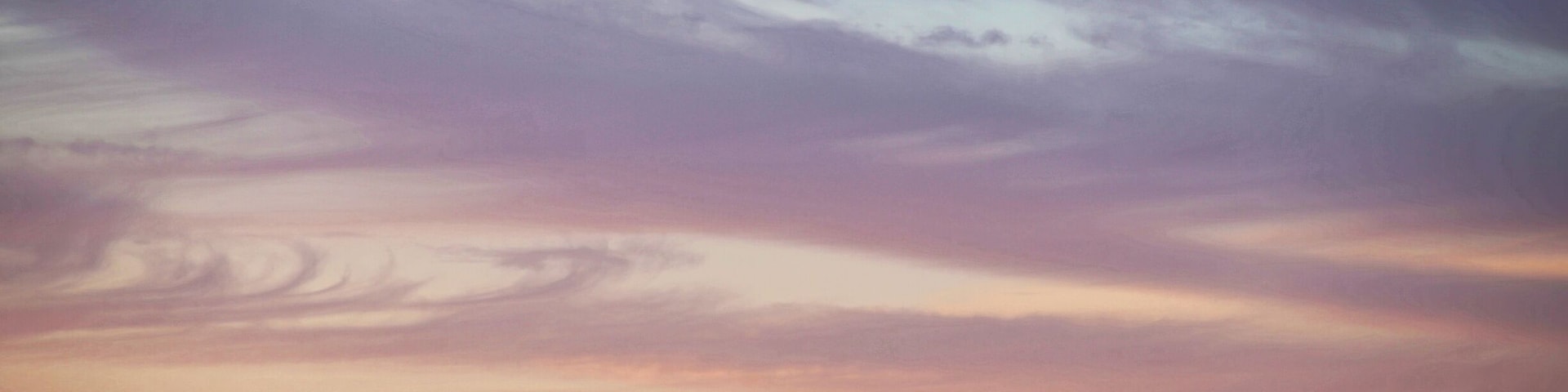 Sunset over the wind farm across the countryside of Quintrell Downs near Newquay in Cornwall.