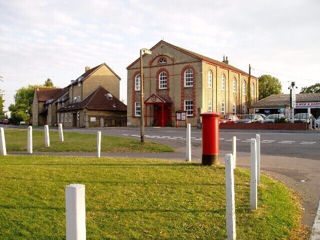 Waterbeach Baptist Church. A barn-like brick structure typical of Victorian non-conformist churches. (Someone will tell me if there's a more accurate architectural term for this style.) Known as Spurgeon's Chapel, the Victorian Baptist preacher Charles Spurgeon preached here on a number of occasions. Originally the windows to the right and left of the doorway ran the whole height of the wall and were not bricked up in the middle. (Thanks to a site user for the extra information.)