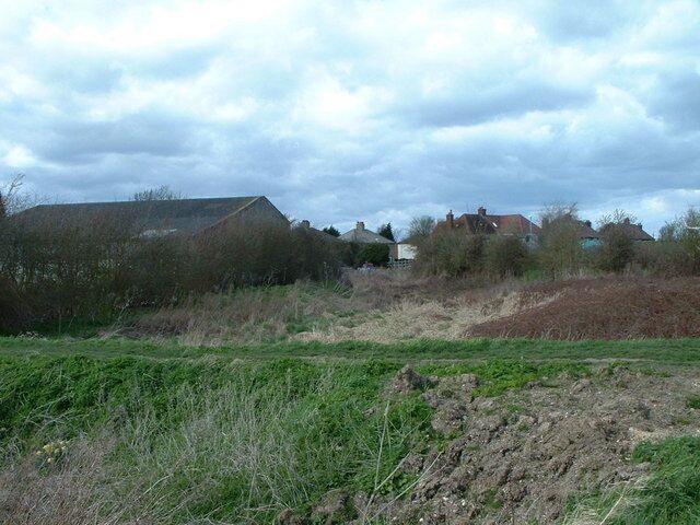 Car Dyke. With my back to the main feature clearly seen in the landscape, the Roman canal disappears into the modern day development of the village.