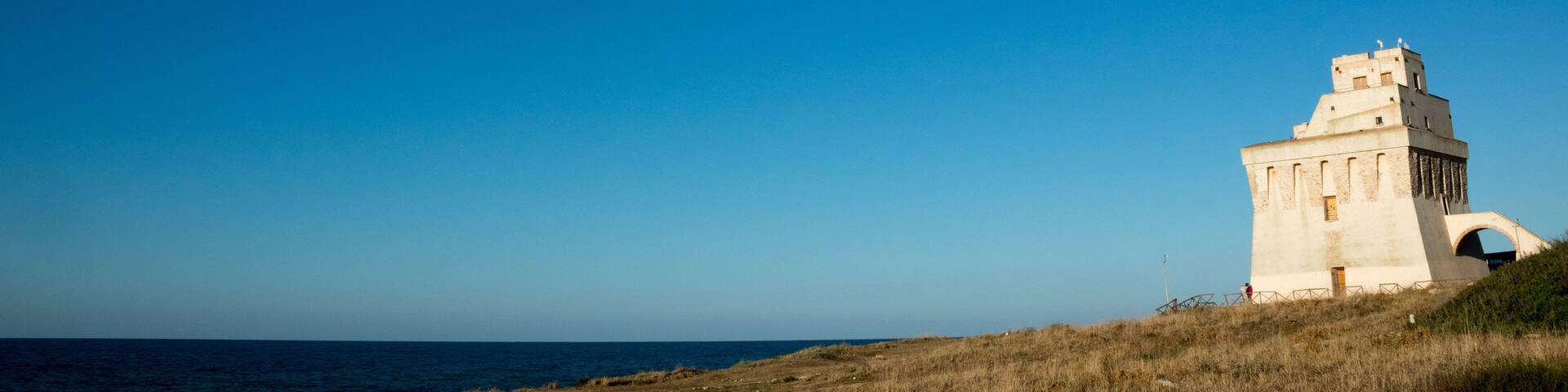 Torre Mileto of Lesina. coastal tower on adriatic sea. San Nicandro Garganico, Foggia, Apulia, Italy