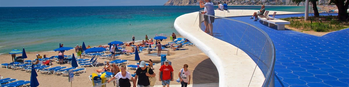 Benidorm Centro featuring a beach and general coastal views as well as a small group of people