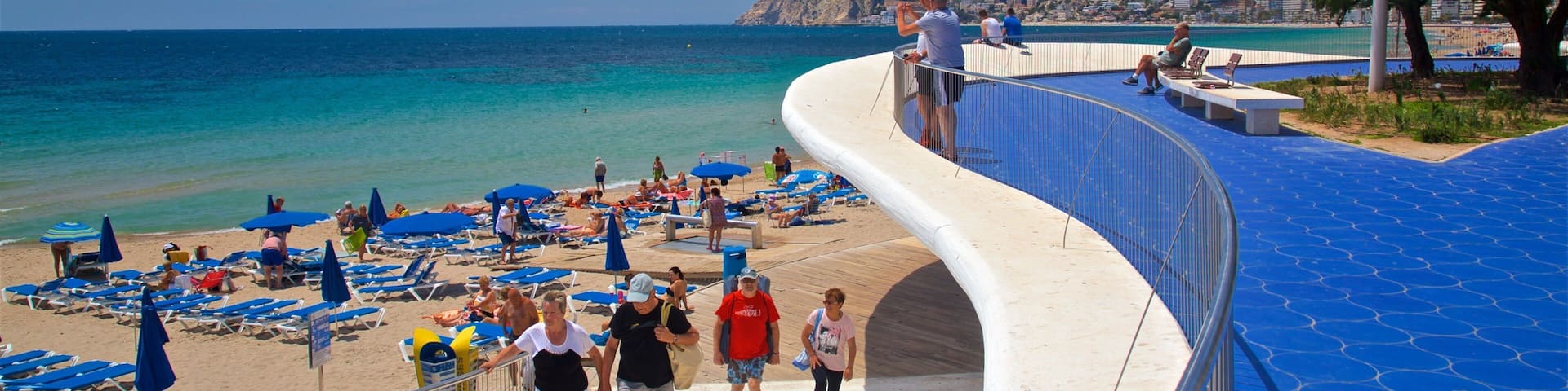 Benidorm Centro featuring a beach and general coastal views as well as a small group of people
