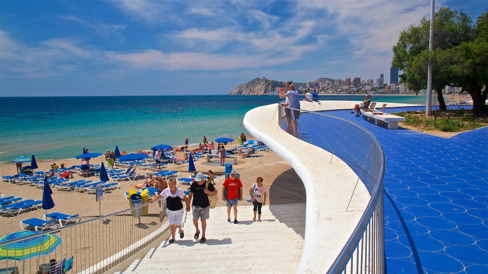 Benidorm Centro featuring a beach and general coastal views as well as a small group of people