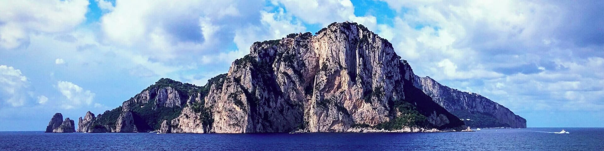 Capri is an island located in the Tyrrhenian Sea off the Sorrentine Peninsula, on the south side of the Gulf of Naples in the Campania region of Italy. The main town Capri that is located on the island shares the name. It has been a resort since the time of the Roman Republic.