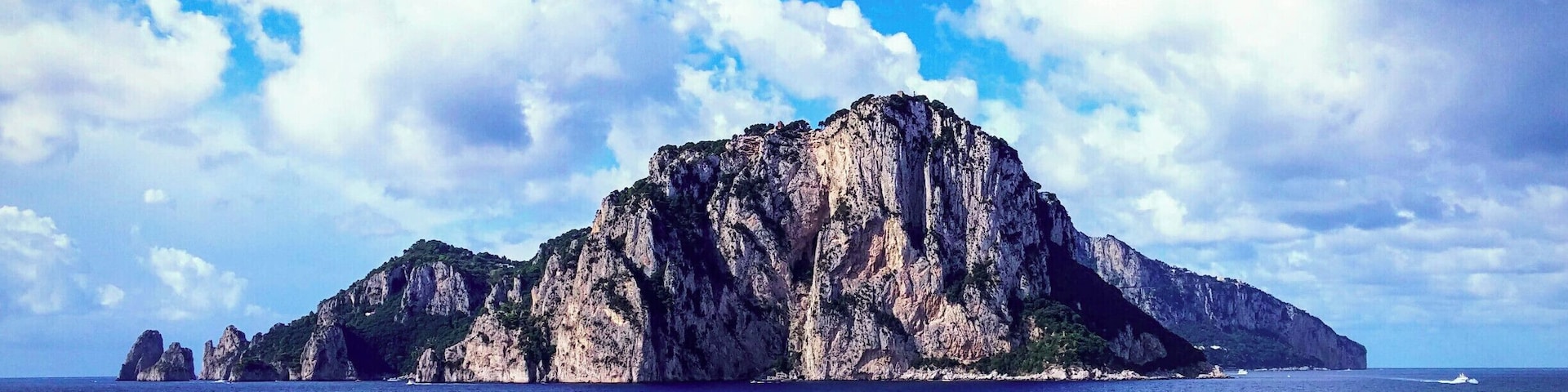 Capri is an island located in the Tyrrhenian Sea off the Sorrentine Peninsula, on the south side of the Gulf of Naples in the Campania region of Italy. The main town Capri that is located on the island shares the name. It has been a resort since the time of the Roman Republic.