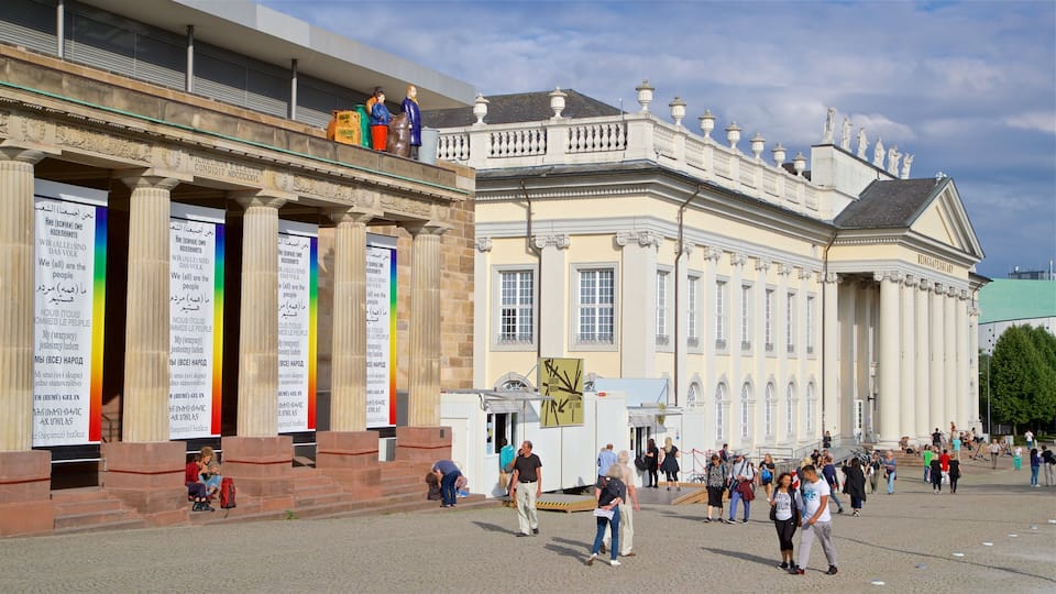 Kassel which includes street scenes and heritage architecture as well as a small group of people