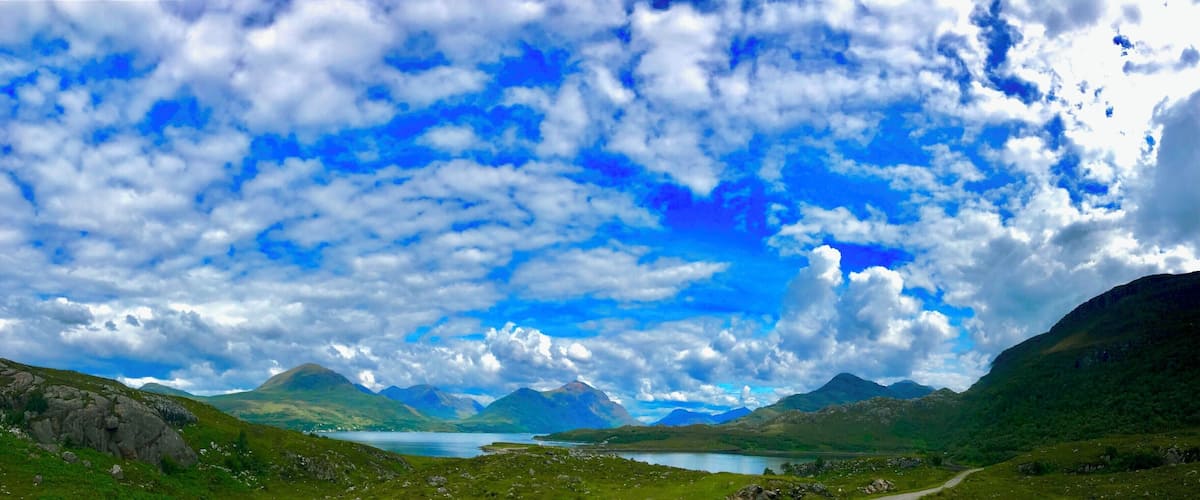 Heading from Loch Torridon to Shieldaig the narrow road with passing places rounds the headland with a last look back towards Beinn Alligin and the surrounding mountains on Loch Torridon,
#BSVblue