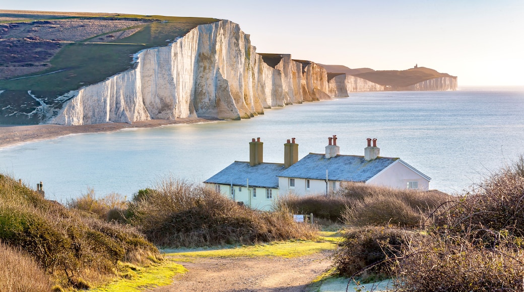 The Coast Guard Cottages and Seven Sisters Chalk Cliffs just outside Eastbourne, Sussex, England, UK.