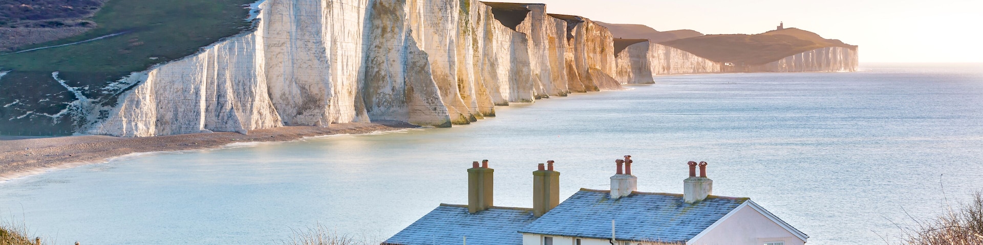 The Coast Guard Cottages and Seven Sisters Chalk Cliffs just outside Eastbourne, Sussex, England, UK.
