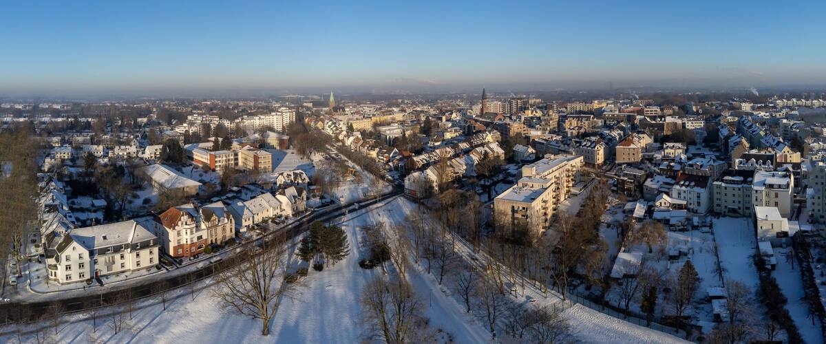 Bochum Wattenscheid town center, aerial snowy winter panorama cityscape