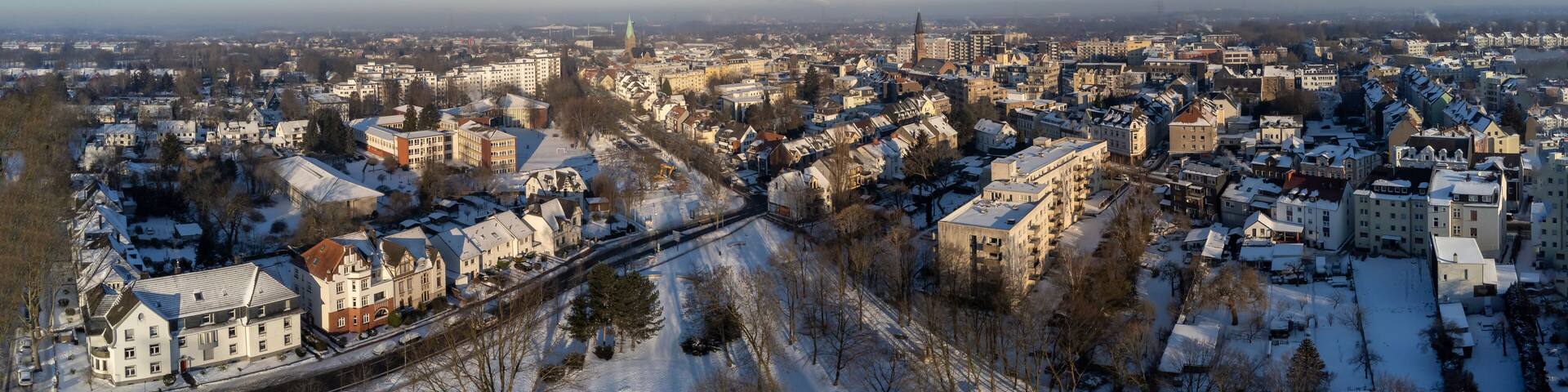 Bochum Wattenscheid town center, aerial snowy winter panorama cityscape
