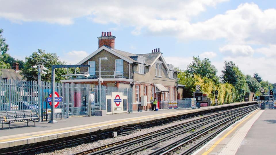 South Harrow station, Piccadilly Line. View southward on the line from Uxbridge and Rayners Lane, towards Acton Town, Piccadilly Circus, King's Cross St Pancras and Cockfosters: London Underground. The Station House is privately occupied
