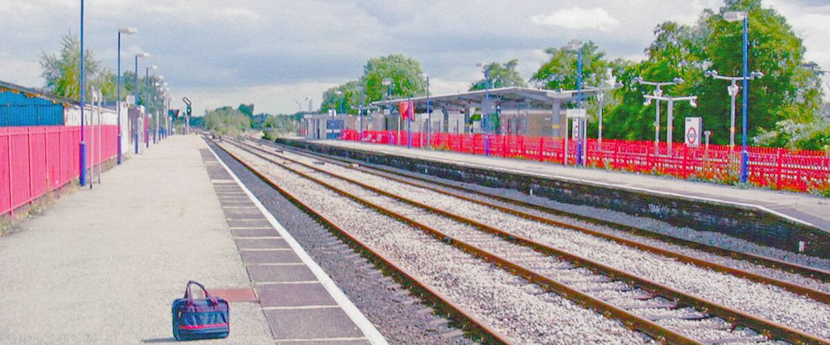 South Ruislip main line station. View SE, towards London Marylebone, formerly also Paddington: ex-GW&GC Joint 'Northolt Junction' of the ex-GC line from Marylebone via Neasden with the ex-GW line from Paddington via North Acton, separating east of here to the left and right respectively. The ex-GW (Acton - Northolt) line has seen very little passenger traffic since this route into Paddington lost regular services in the 1960s. Local trains to/from Marylebone continue at these platforms, but the LUL Central Line platforms over on the right are far busier