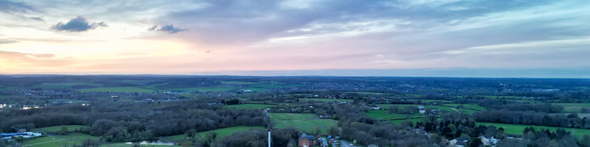 High Angle View of Harefield Town London, Uxbridge, England, United Kingdom During Sunset. Aerial Footage Was Captured with Drone's Camera from Medium High Altitude on April 3rd, 2024