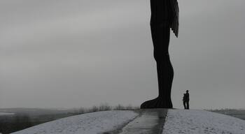 We lived in the North East of England for several years and I drove past the awesome Angel of the North pretty much every day.
This pic is towards the end of Winter but still cold, with snow and grey skies, sun trying to peek through the grey.
If you're in the wonderful North East, be sure to stop in off the motorway and check out the sheer size of this sculpture.
6.4.2008