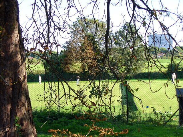 Surbiton Croquet Club Sunday Sport in Suburbia. Tolworth Tower is in the distance.