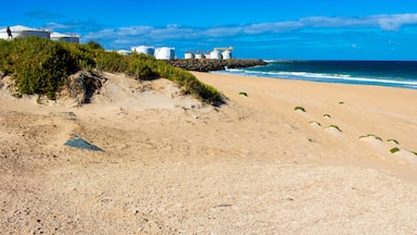 The Breakwater, Bunbury Outer Harbour Western Australia is a basalt formation which ends in Point Casuarina and is a wall of stone reaching into the Indian Ocean with old white storage tanks., Shutte