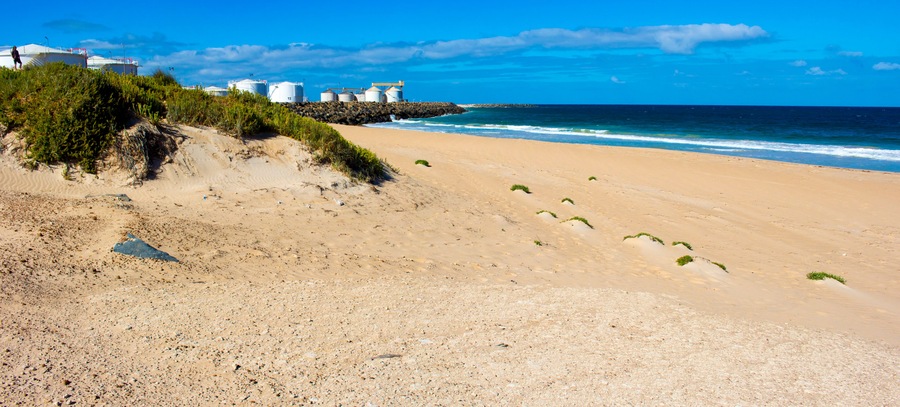 The Breakwater, Bunbury Outer Harbour Western Australia is a basalt formation which ends in Point Casuarina and is a wall of stone reaching into the Indian Ocean with old white storage tanks., Shutte