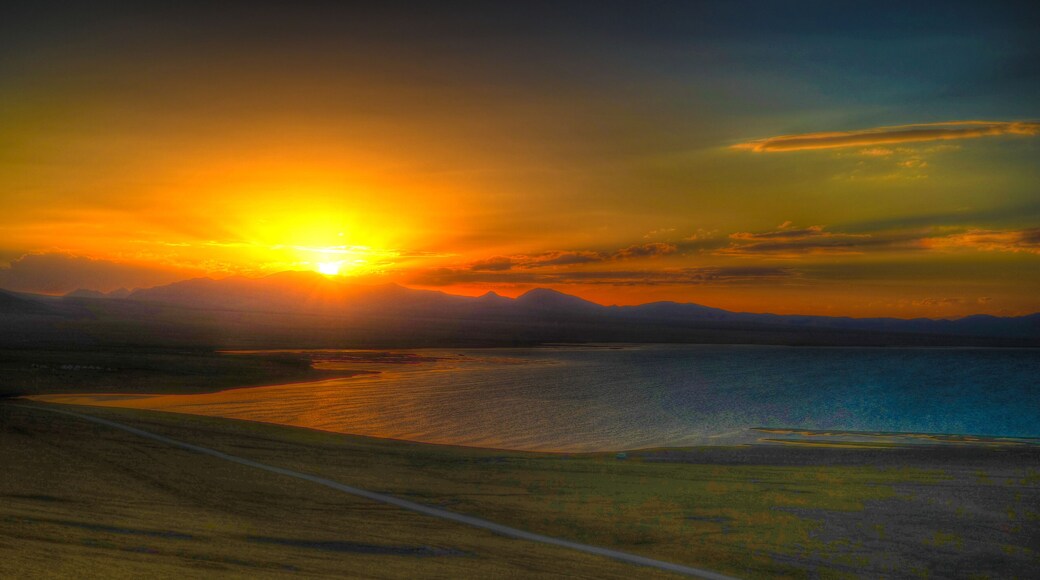Panorama of Song Kul lake at the sunset, Kyrgyzstan
