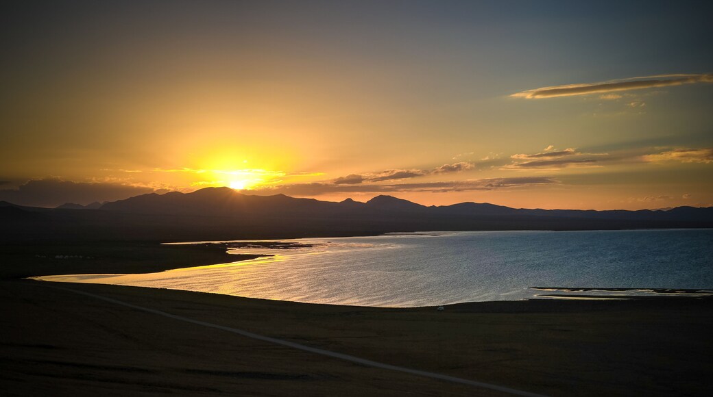Panorama of Song Kul lake at the sunset, Kyrgyzstan
