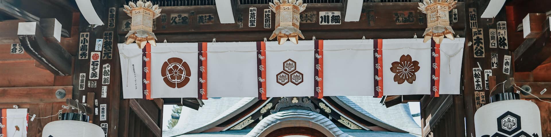 Girl in red suit in front of Kushida Shrine is a Shinto shrine located in Hakata-ku, Fukuoka, Japan.