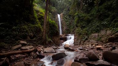 Panoramic beautiful deep forest waterfall in Nanggala III Nature Water Park, Palopo, South Sulawesi, Indonesia