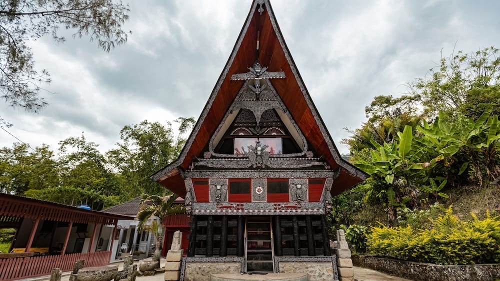 Traditional Toba batak houses with pointed roofs at Samosir island at Toba lake North Sumatra Indonesia