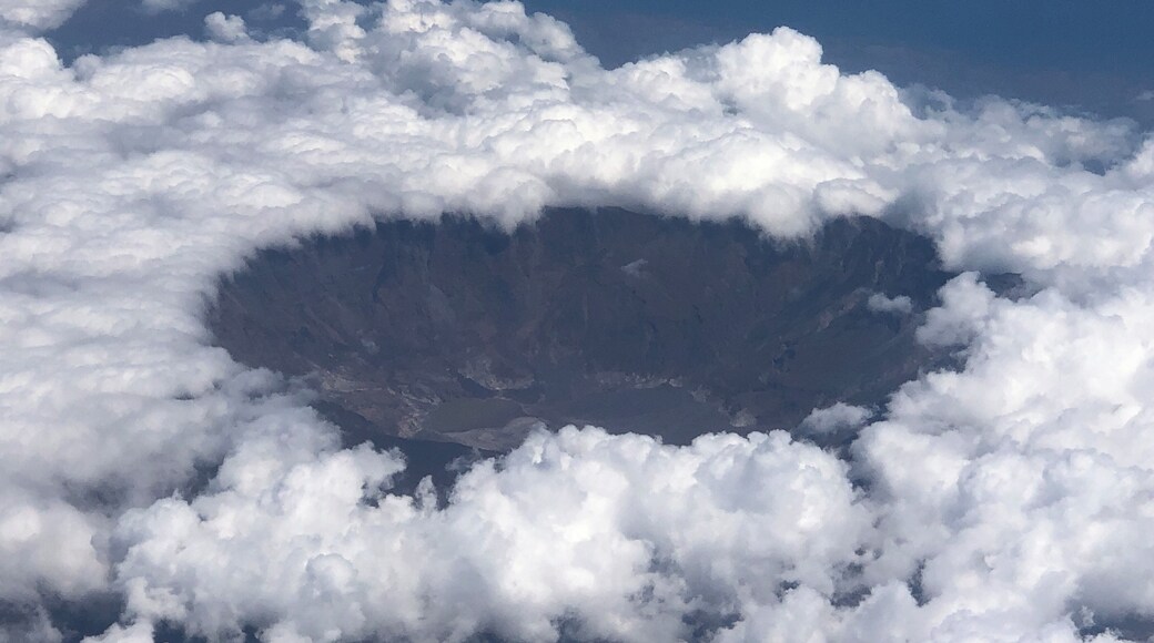 Clear of clouds in the middle at Mt Rinjani; taken from the flight to Labuan Bajo from Surabaya. The the right window seat (facing the cockpit) to have this view.