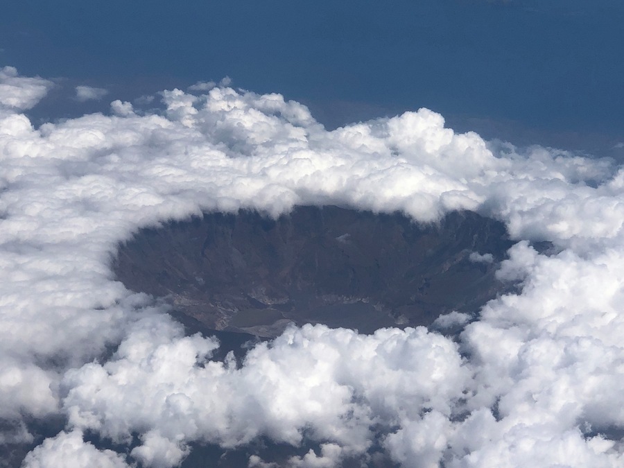 Clear of clouds in the middle at Mt Rinjani; taken from the flight to Labuan Bajo from Surabaya. The the right window seat (facing the cockpit) to have this view.