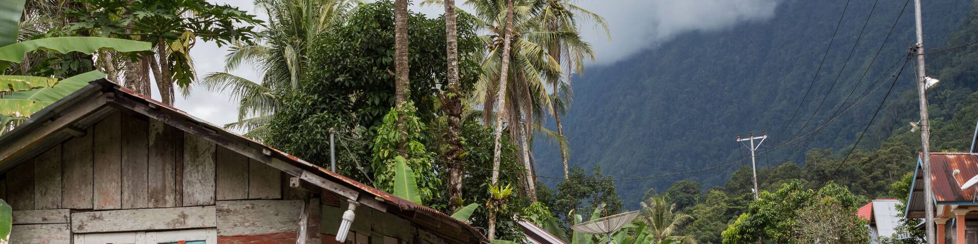 Travel Tourist in Indonesia on scooter at Danau Maninjau in Sumatra