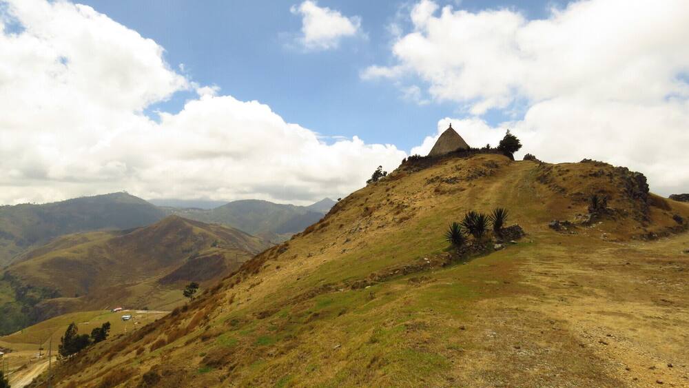 About 30m drive from Maubisse lies the village of Flecha. Perked on a hill top just above the village sits the uma-lulik, sacred house, and a tiny graveyard. This place doesn't get many visitors, so expect to be swarmed by the locals #Culture