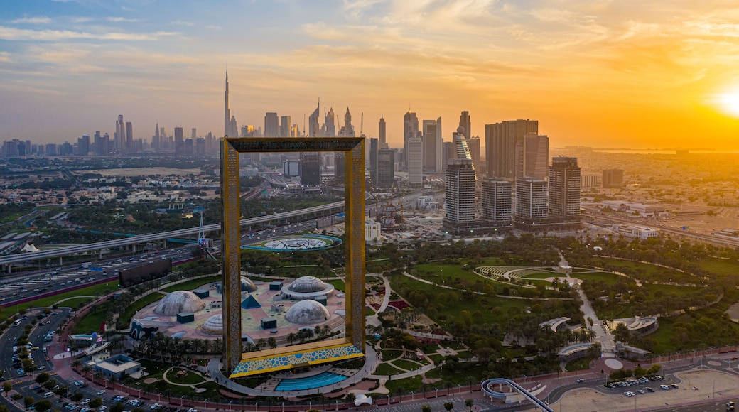 Futuristic city skyline of Dubai during a golden hour sunset