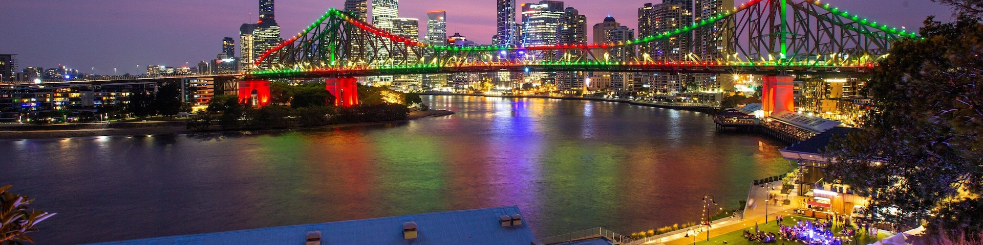 Wilson Outlook Reserve showing a sunset, a bridge and a city