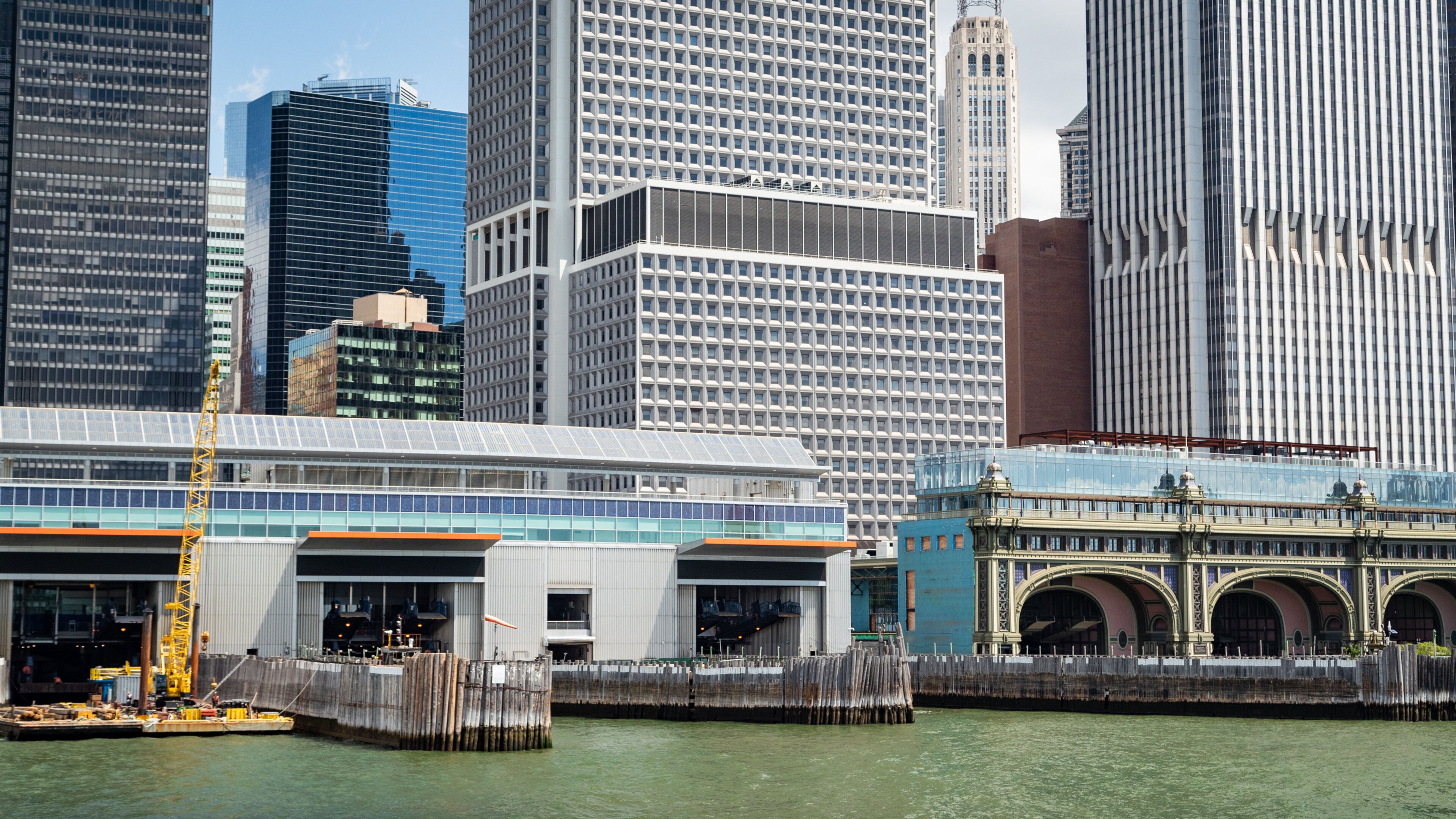 Staten Island Ferry Whitehall Terminal showing a city and a bay or harbor