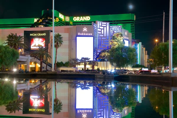 MGM Grand Casino showing a hotel, signage and night scenes
