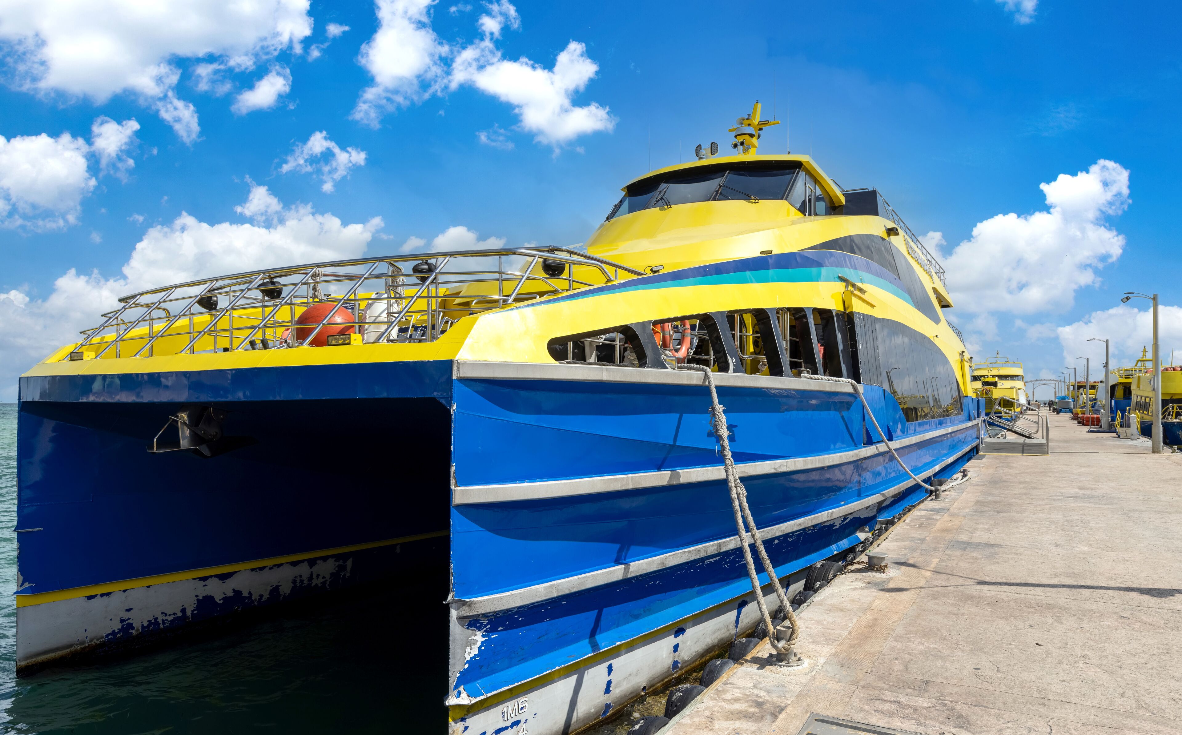 High-speed ferry at the terminal of Isla Mujeres waiting for passengers to return to Cancun.