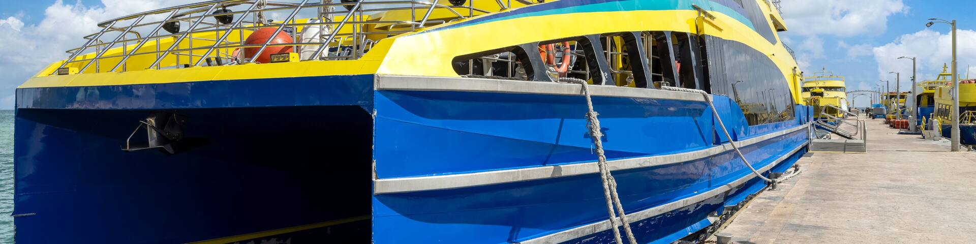 High-speed ferry at the terminal of Isla Mujeres waiting for passengers to return to Cancun.
