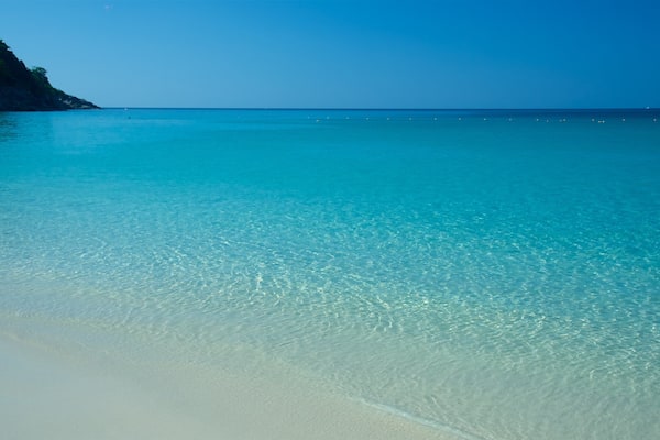 Freedom Beach featuring general coastal views, a sandy beach and tropical scenes
