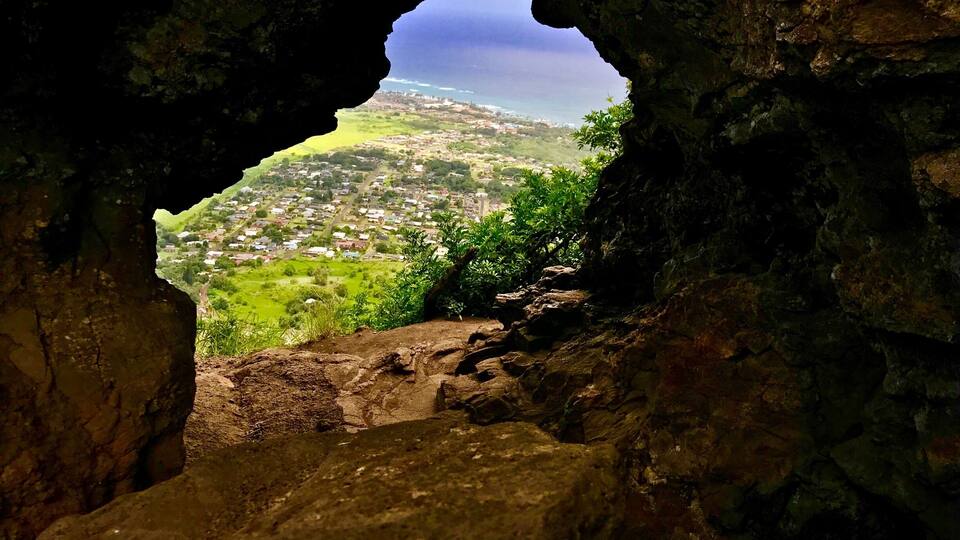 The Nounou Mountain or Sleeping Giant (looks like a giant laying on his back) offers the best views of the East coastline. For the daring, climb to the top of the nose and gander at the 360 degree views of Kapa'a. This image is from inside the nose, a wind tunnel and great place to rest. By far the best hike on Kauai thus far. #takeahike
