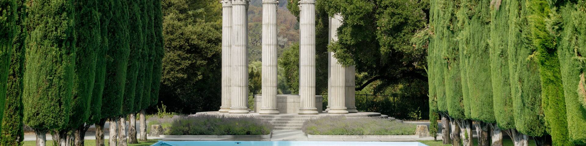 Pulgas Water Temple with Reflecting Pool and Cypress Trees. Woodside, San Mateo County, California, USA.
