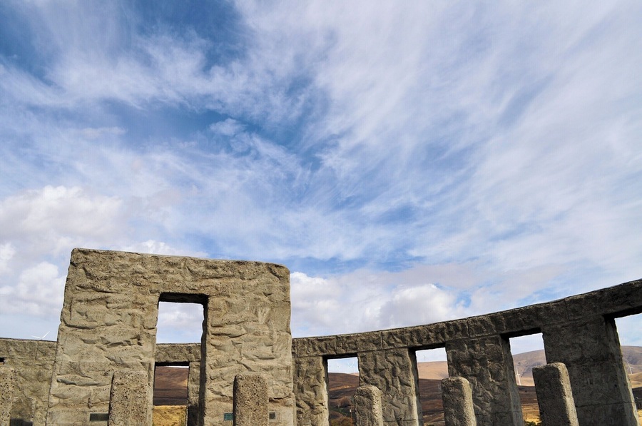 Maryhill's Stonehenge sits on a hillside that overlooks the Columbia River in Eastern Washington. It was completed in 1929 to the original Stonehenge dimensions by Sam Hill, a local philanthropist, as a war memorial to the servicemen who died in Klickitat County during WWI.
This roadside attraction is free with beautiful vistas of rolling golden hills and endless blue sky. #architecture #monuments #roadtrip #StunningStructures