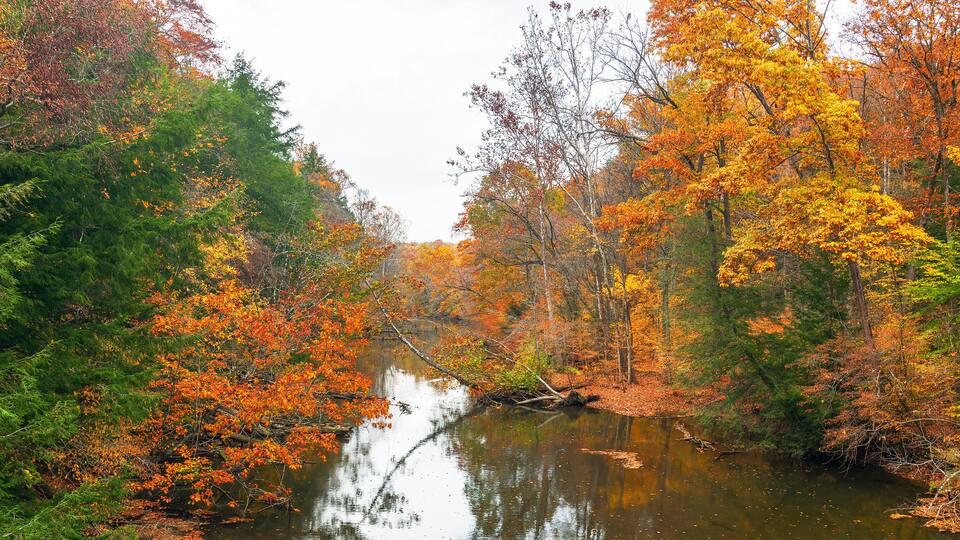 Colorful view of the Clear Fork Branch of the Mohican River upstream from the Mohican bridge.Mohican State Park