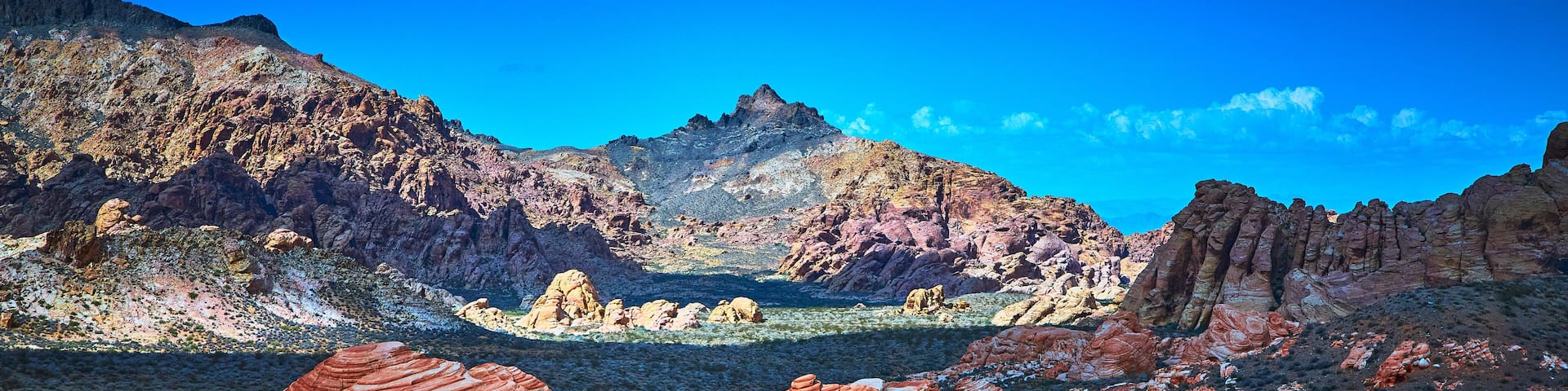 Red Sandstone Formations Rugged Nevada Desert Landscape Under Deep Blue Sky
